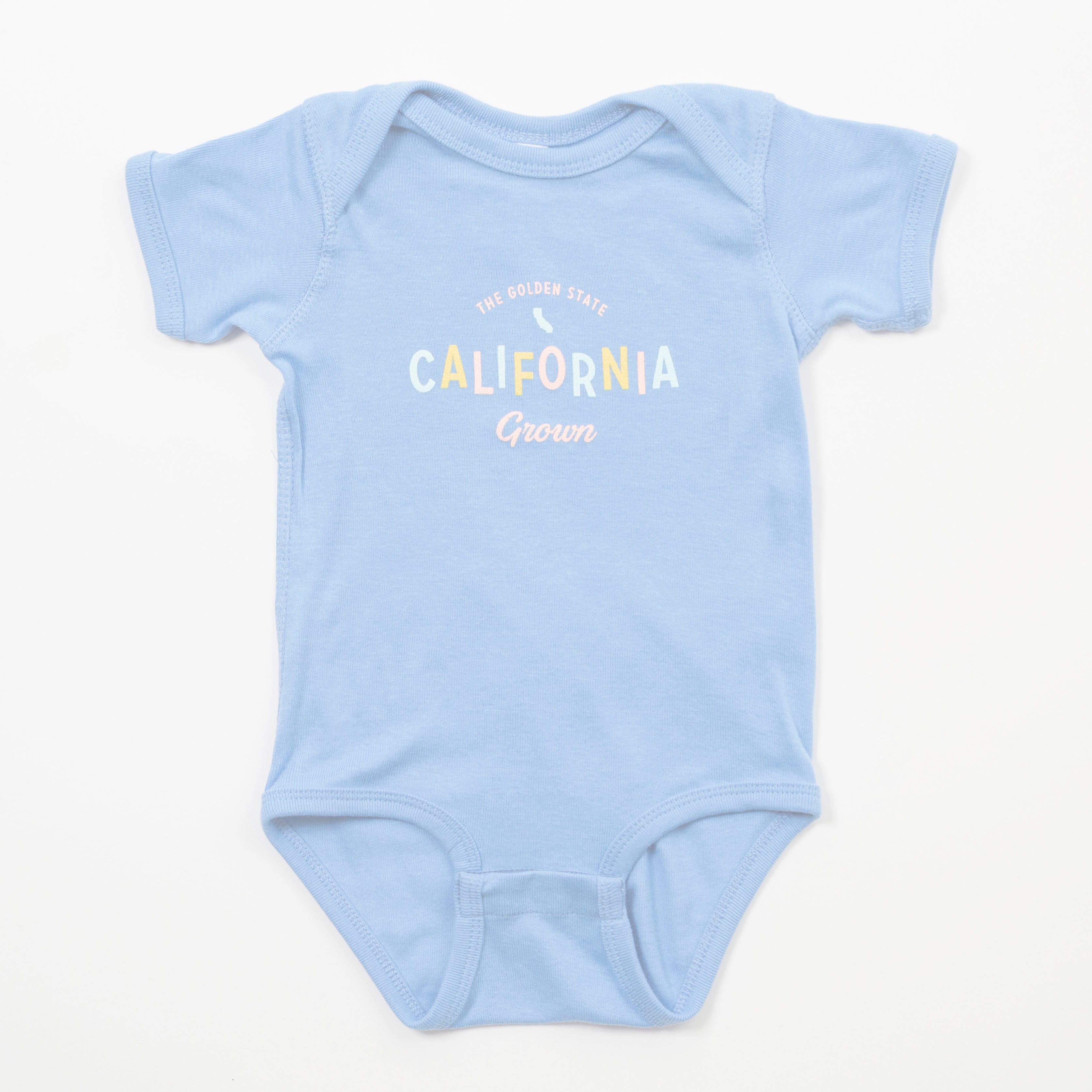 Light blue baby onesie with 'California Grown' text on a white background - Upper Park Baby Onesie California Collection