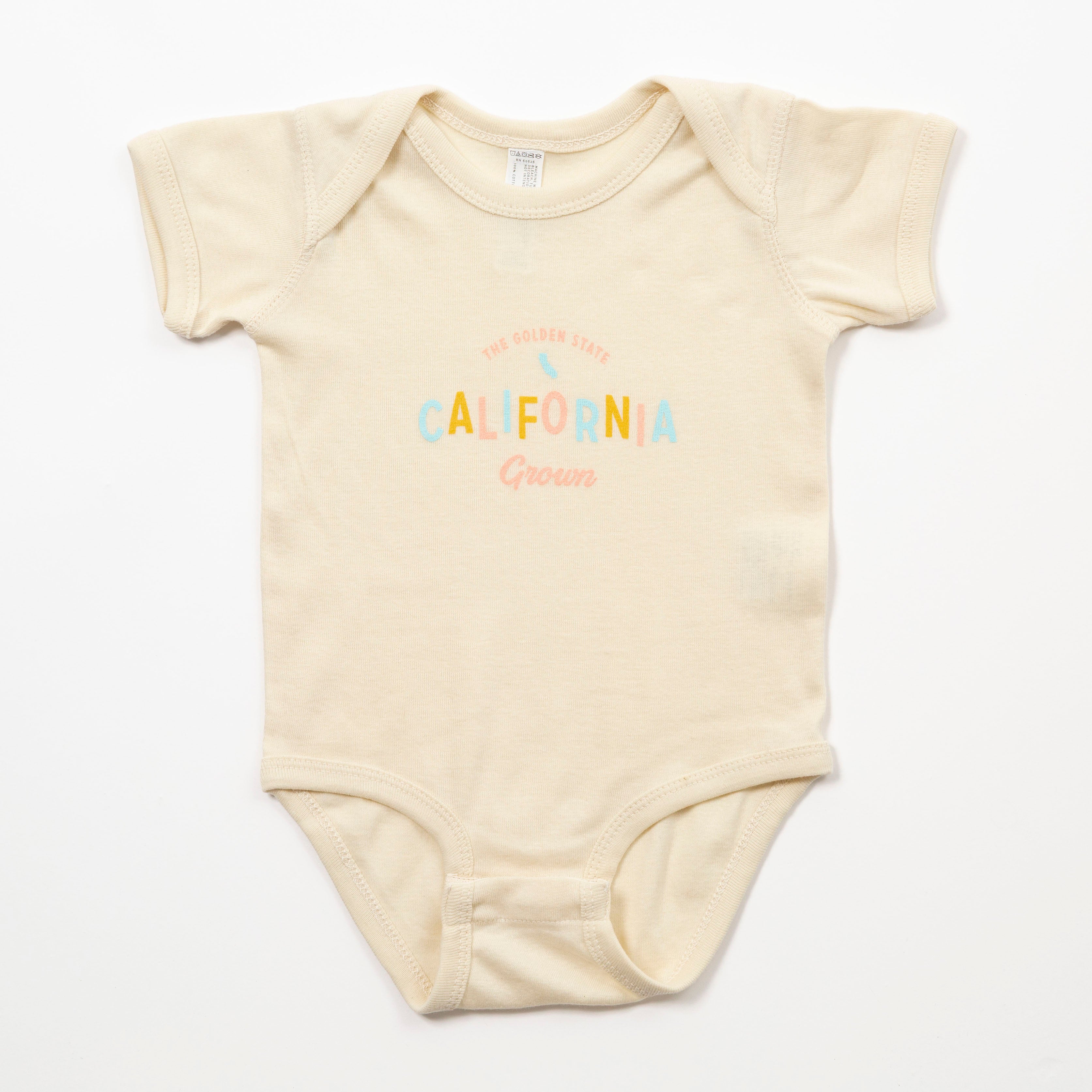 Beige baby onesie with 'California Grown' text on a white background - Upper Park Baby Onesie California Collection