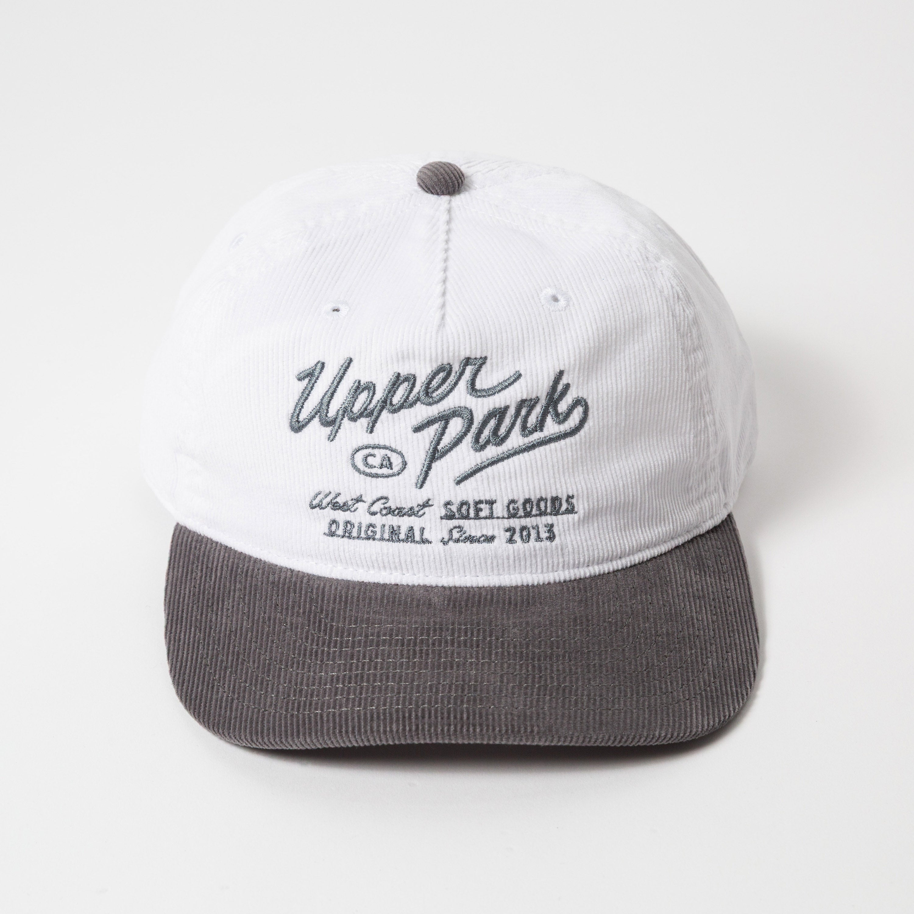 Menlo Embroidered Corduroy Hat - White and gray cap with 'Upper Park' branding on a white background