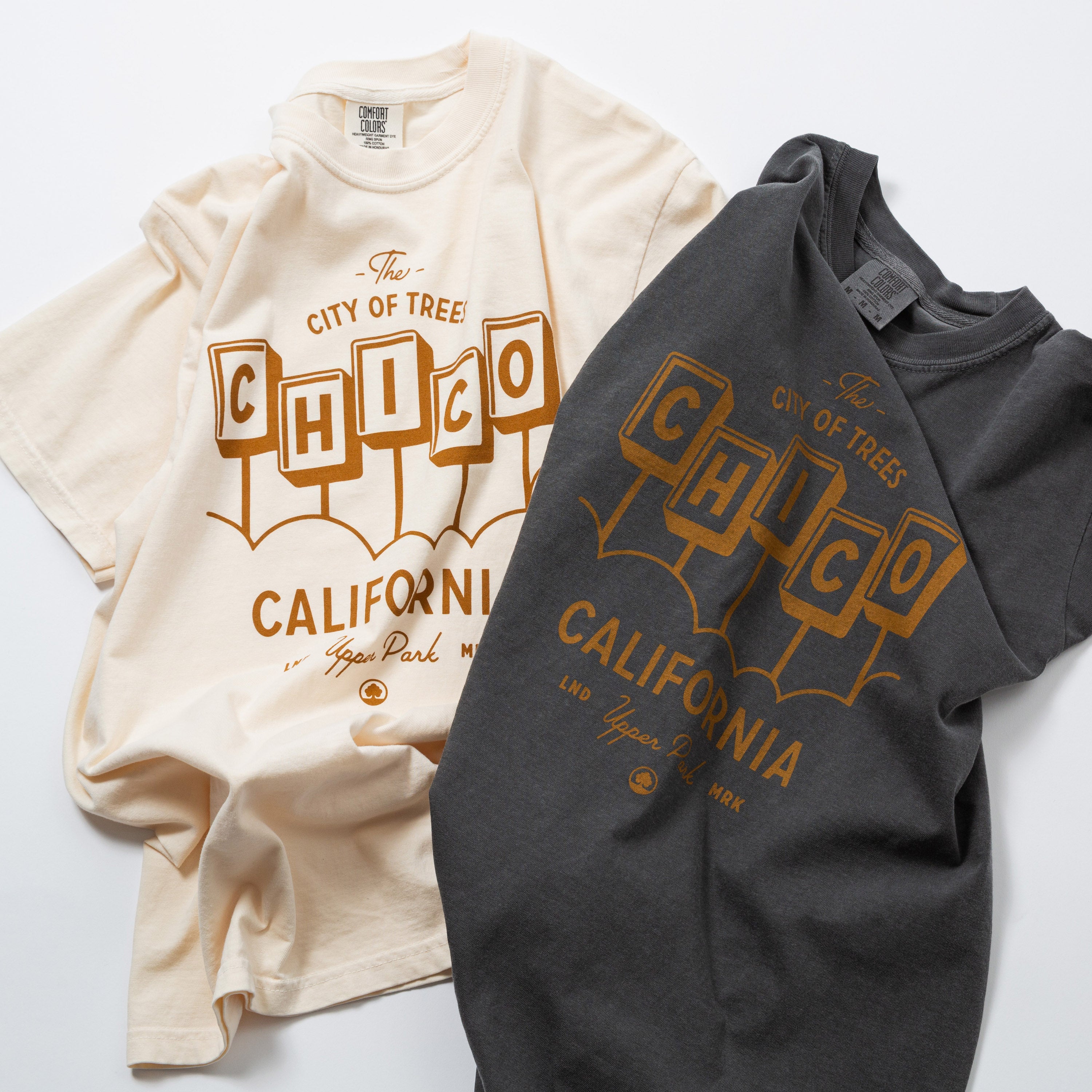 Two t-shirts with 'Chico California' text design on a white background