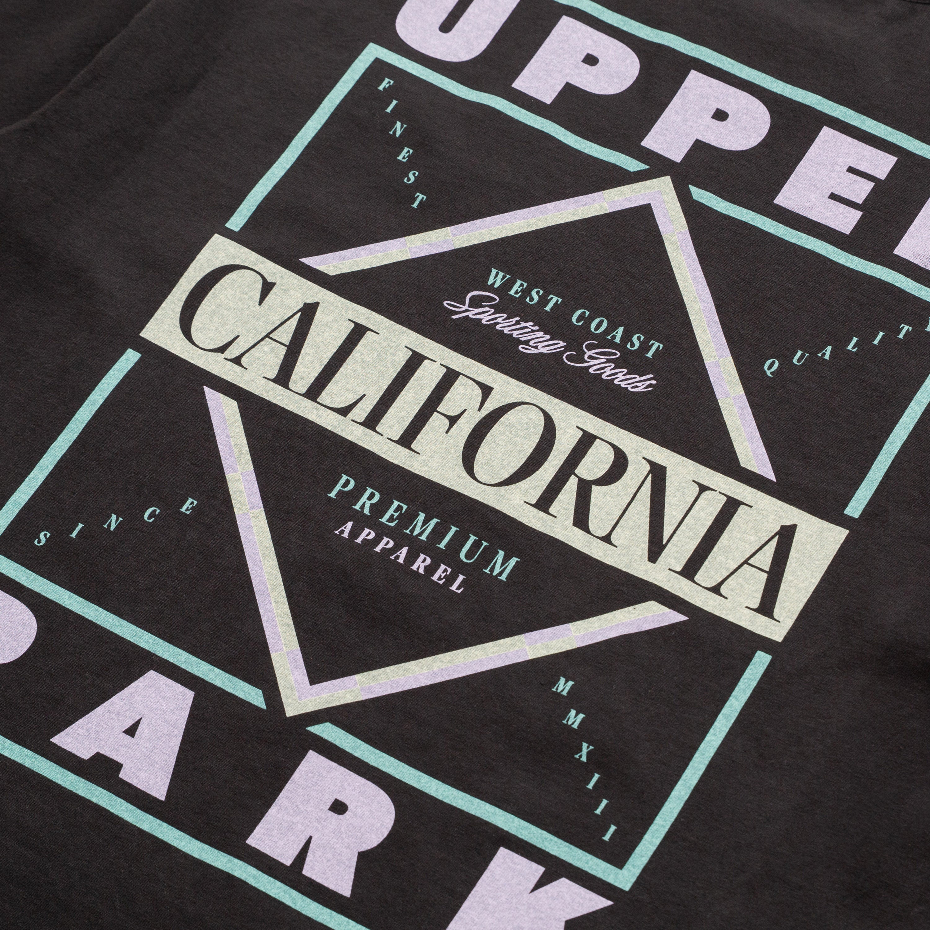 Black t-shirt with 'California' and 'West Coast' text design on a dark background
