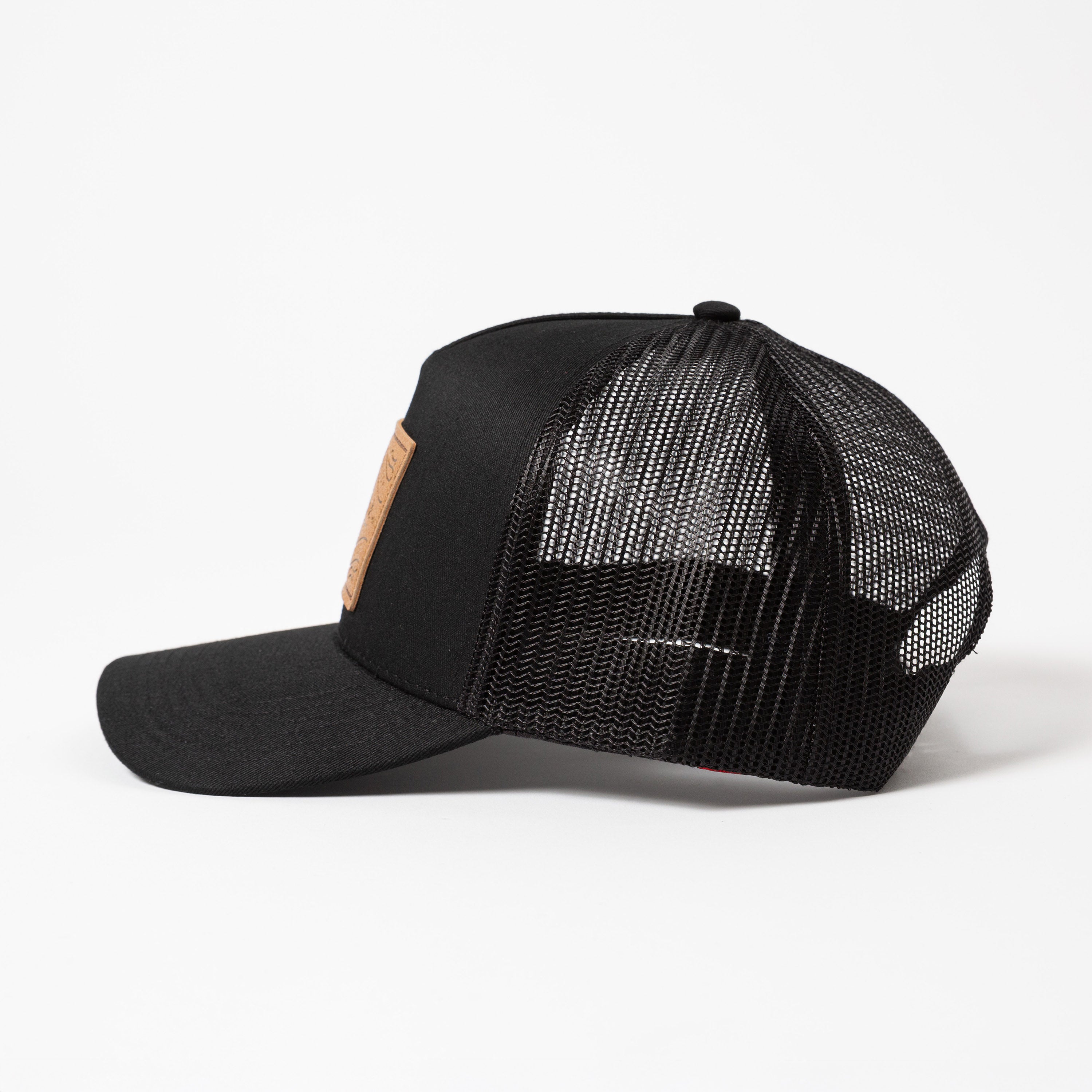 Upper Park Pro Label 5 Panel Trucker Hat - Black mesh cap on a white background