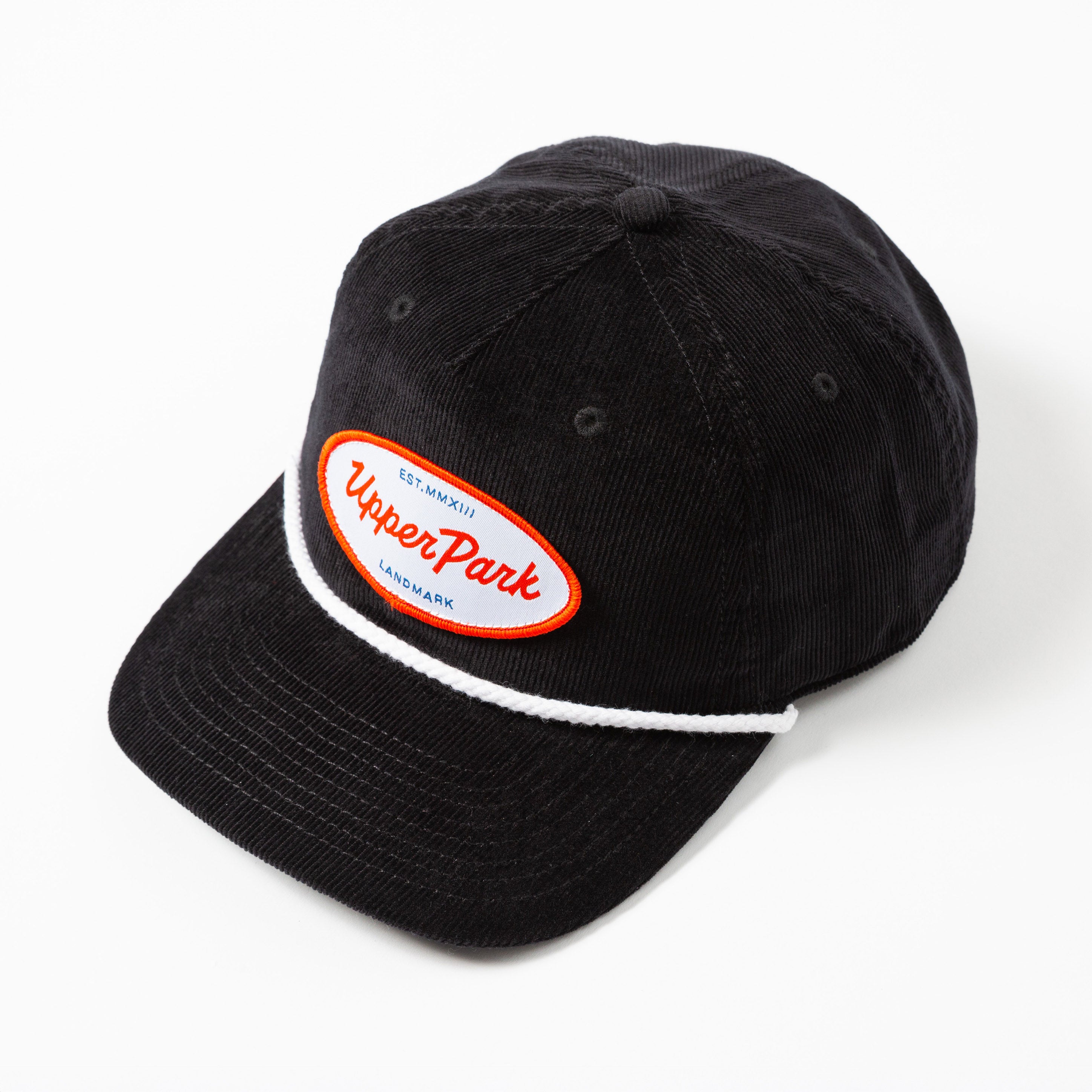 Black cap with 'Upper Park' logo on a white background - Values Corduroy Rope Hat