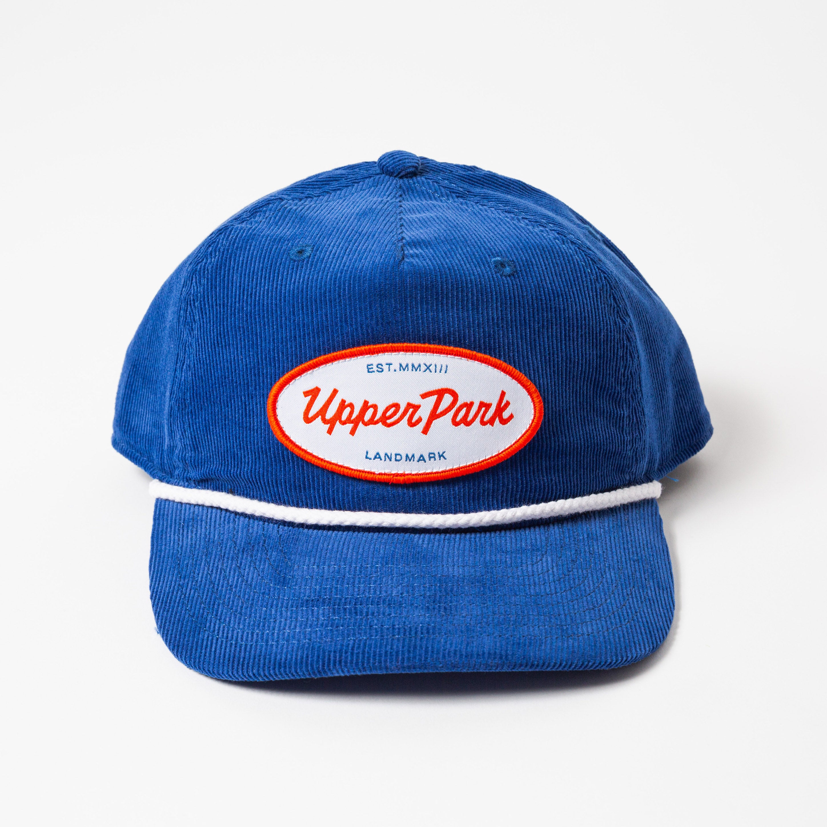 Blue cap with 'Upper Park' logo on a white background - Values Corduroy Rope Hat