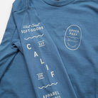 Bay Waves Standard Long Sleeve Shirt - Upper Park Clothing - Blue t-shirt with white text and branding on a white background