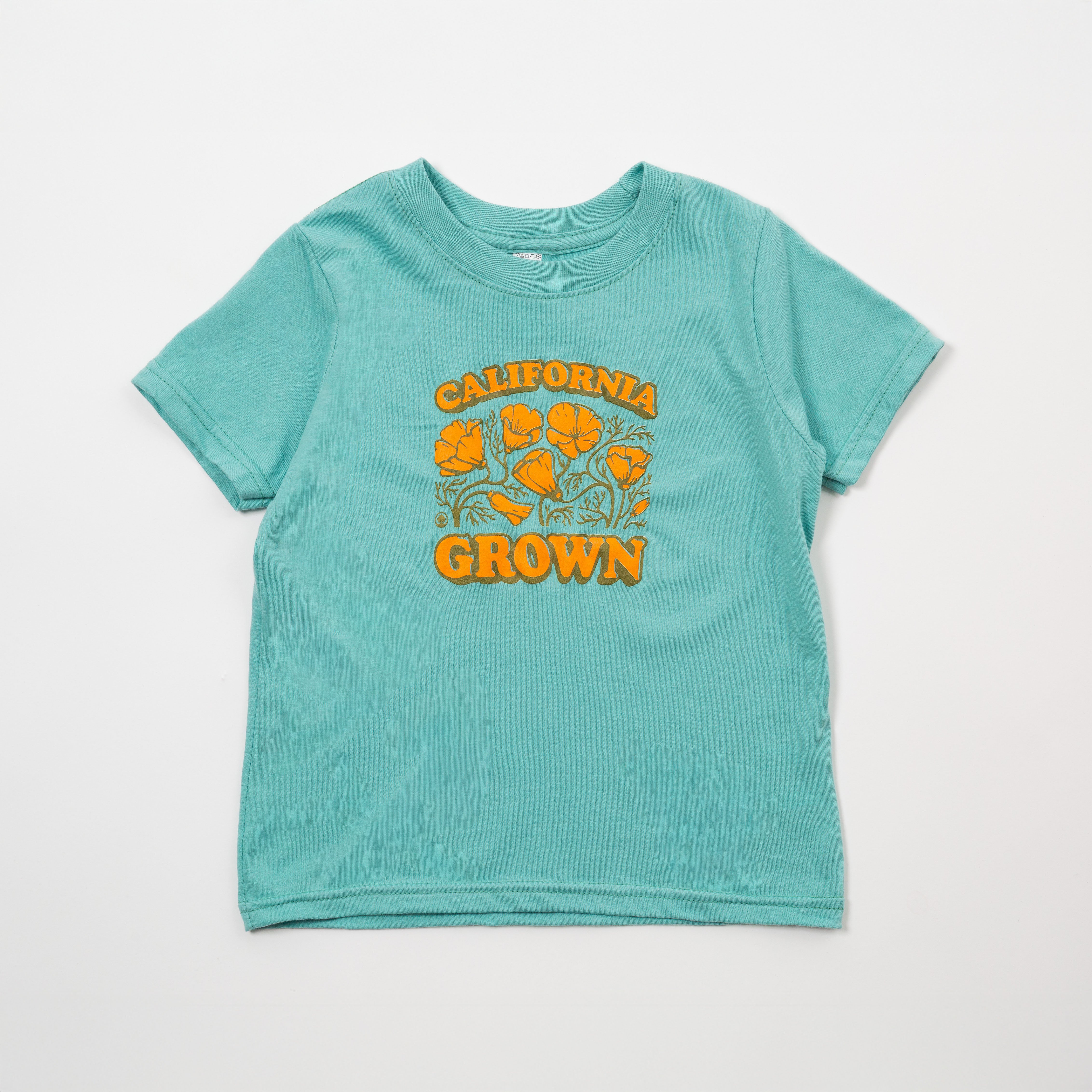 Teal t-shirt with 'California Grown' and flower design on a white background
