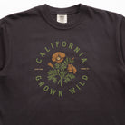 Black t-shirt with 'California Grown Wild' graphic design on a plain background