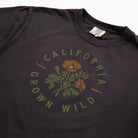 Black t-shirt with 'California Grown Wild' graphic on a white background