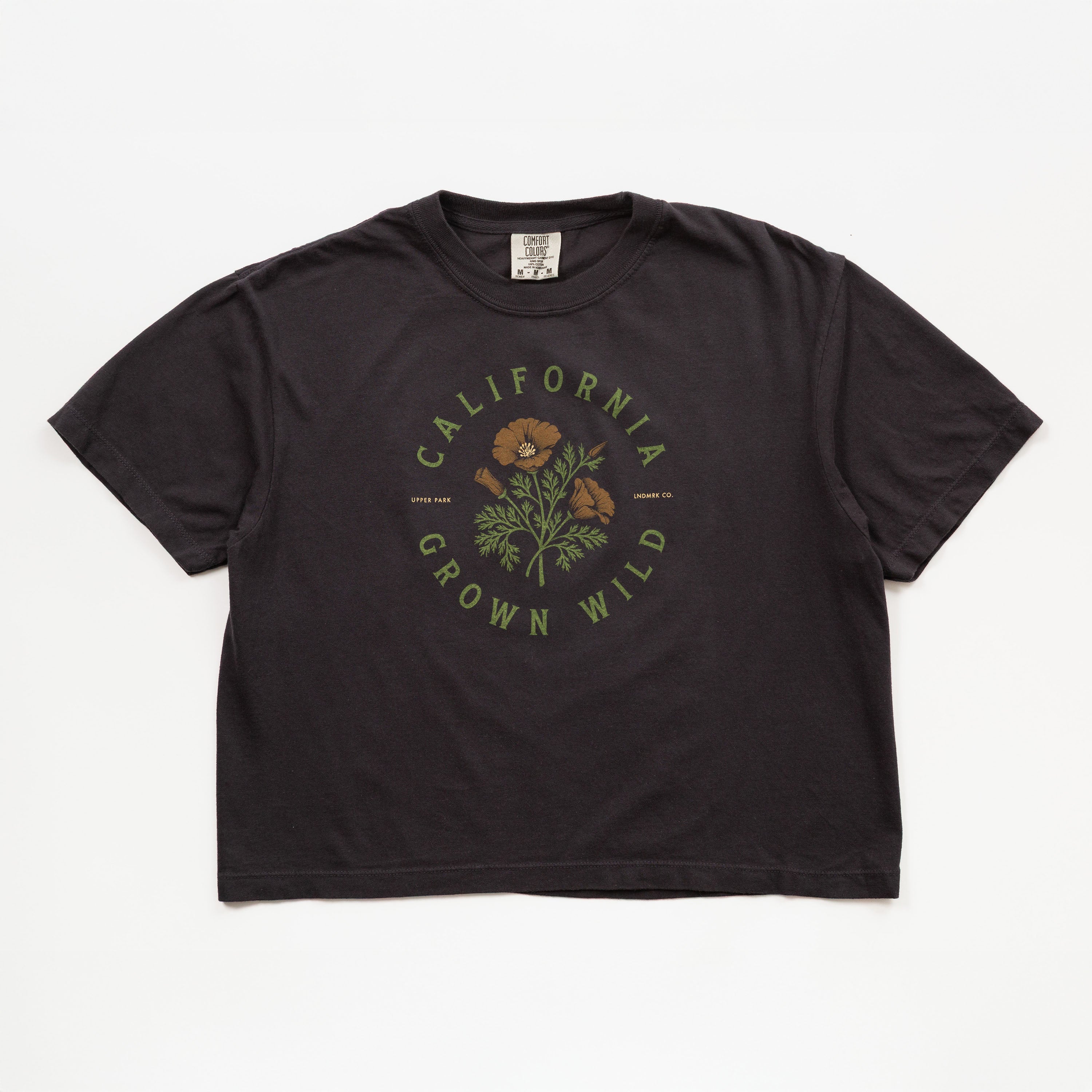 Black t-shirt with 'California Grown Wild' graphic on a white background