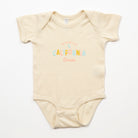 Beige baby onesie with 'California Grown' text on a white background - Upper Park Baby Onesie California Collection