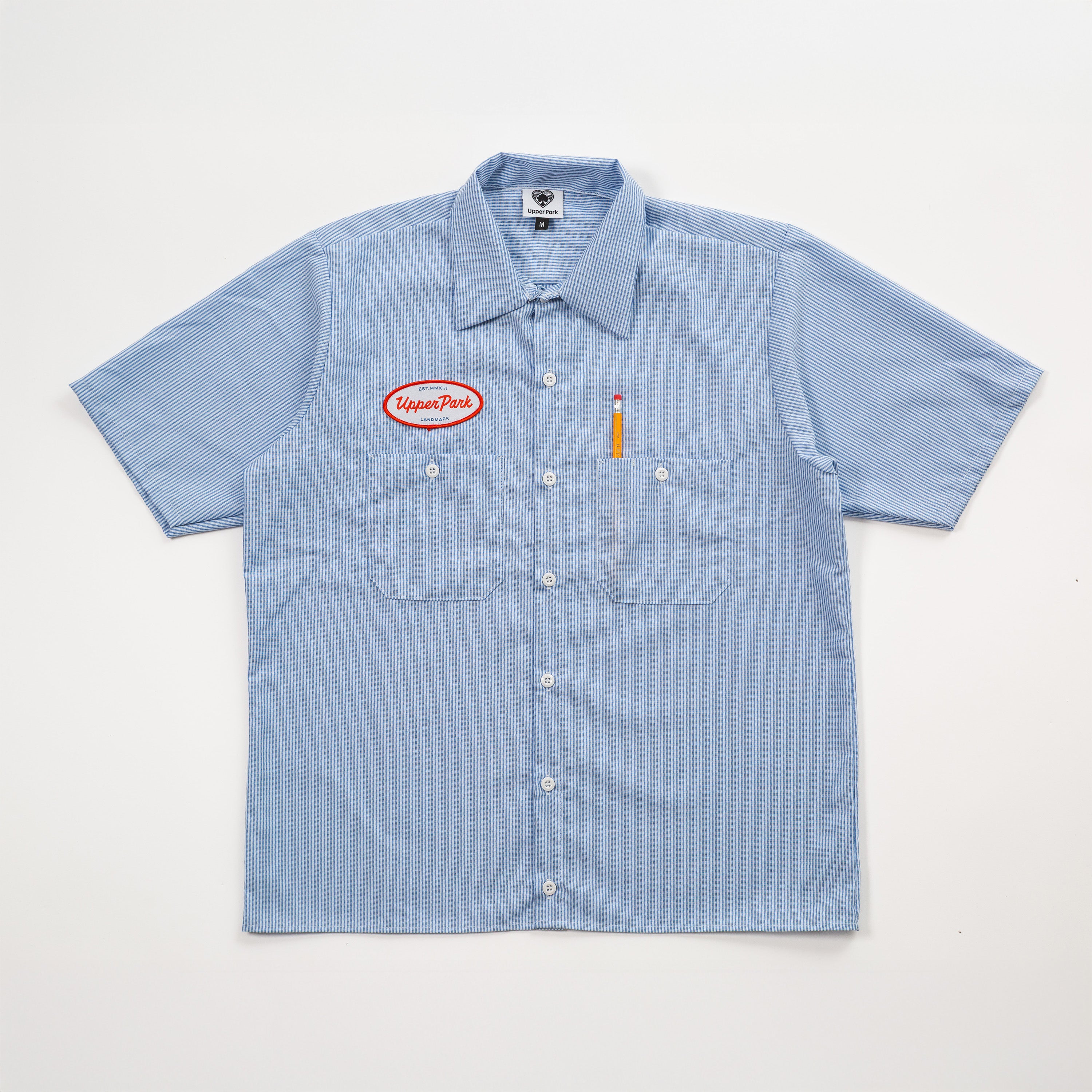 Blue striped shirt with a logo on a white background