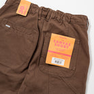 Men's Shorts Heavy Duck Canvas - Upper Park Clothing - Brown canvas shorts with a label on a white background