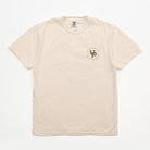 A light beige crewneck t-shirt with a small circular chest graphic on the left side. The graphic features a green and gold logo with the text 'SD 2025 WESTERN CALIFORNIA CHAMPIONS'.