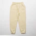 Yellow sweatpants with a brand logo on a light gray background - Upper Park Athletics Sweatpants Set