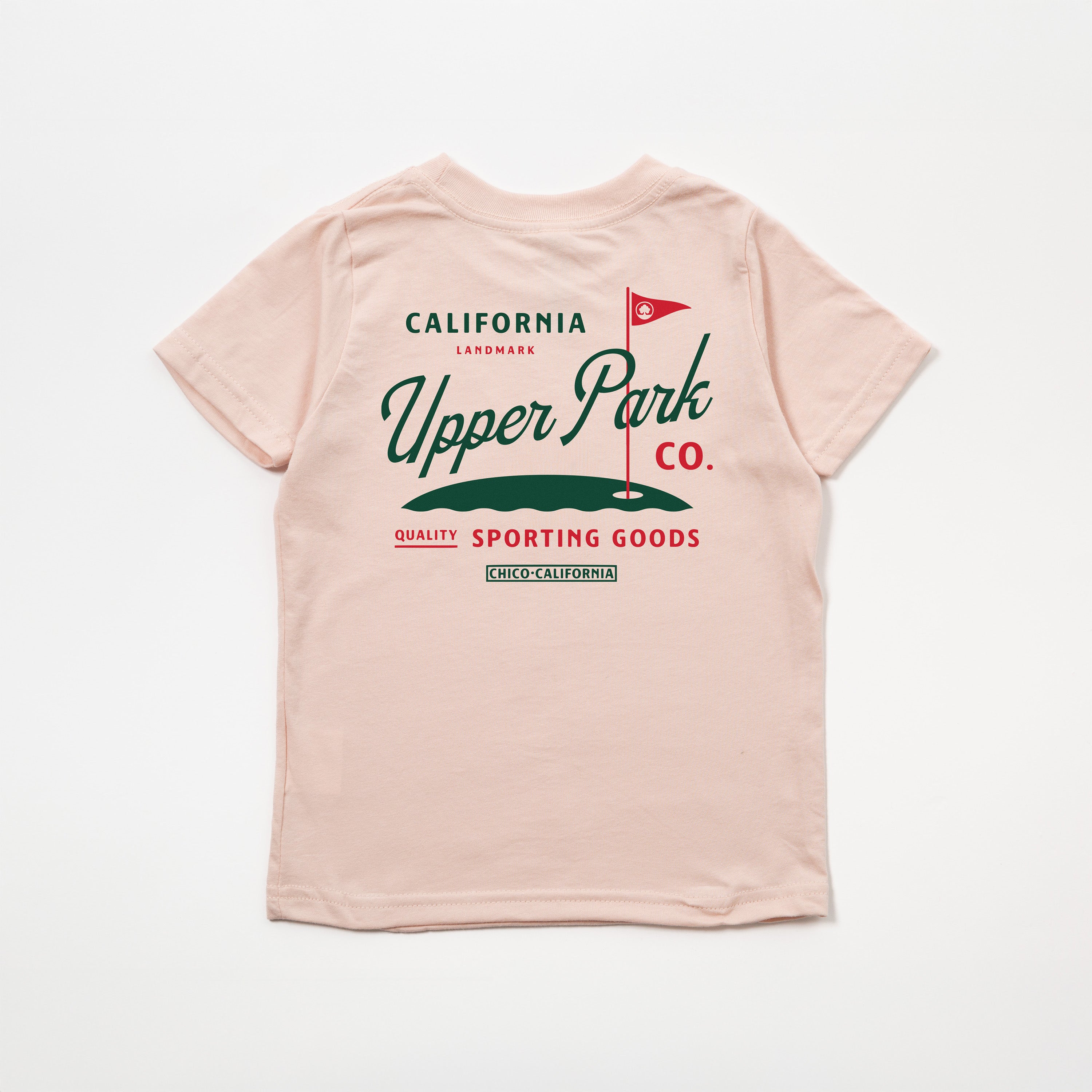 Pink t-shirt with 'California Upper Park Co.' graphic on a white background