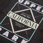 Black t-shirt with 'California' and 'West Coast' text design on a dark background