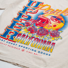 Upper Park Varsity Rose Football Tee - Beige sweatshirt with colorful graphic design featuring text and graphics on a white background